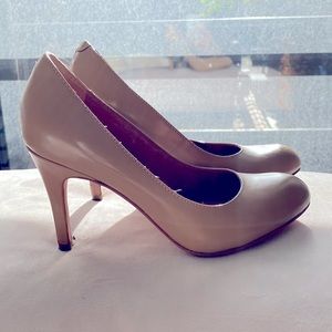 Beige patent pumps